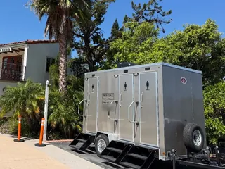 A restroom trailer at a wedding venue